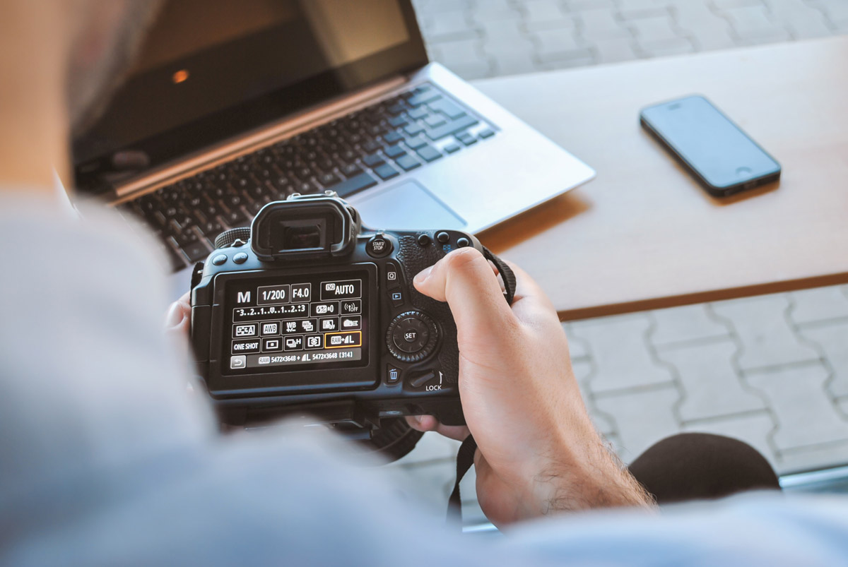 Photographer and laptop